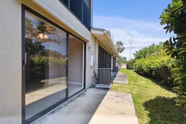 2131 Ridge Rd S Unit 3, Largo, FL 33778 - view of grassy yard featuring central air condition unit and a patio area