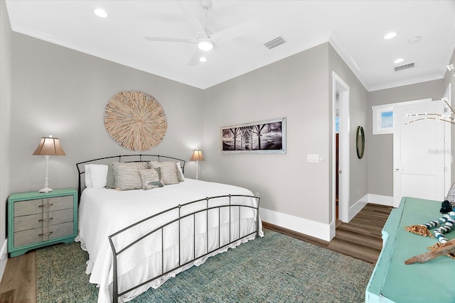 110 Carlyle Dr, Palm Harbor, FL 34683 - bedroom with wood finished floors, recessed lighting, crown molding, and ceiling fan