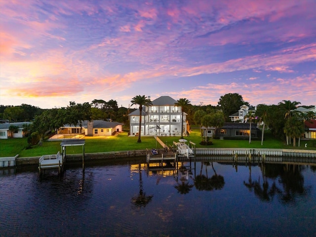 110 Carlyle Dr, Palm Harbor, FL 34683 - water view featuring boat lift and a dock