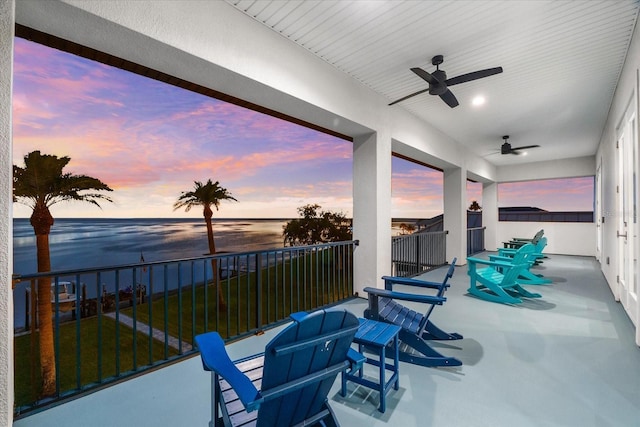 110 Carlyle Dr, Palm Harbor, FL 34683 - patio / terrace with ceiling fan and a water view