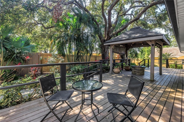 7461 Pescador Pl, Seminole, FL 33772 - wooden deck with a gazebo and a fenced backyard