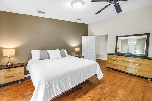 7461 Pescador Pl, Seminole, FL 33772 - bedroom featuring wood finished floors and a ceiling fan