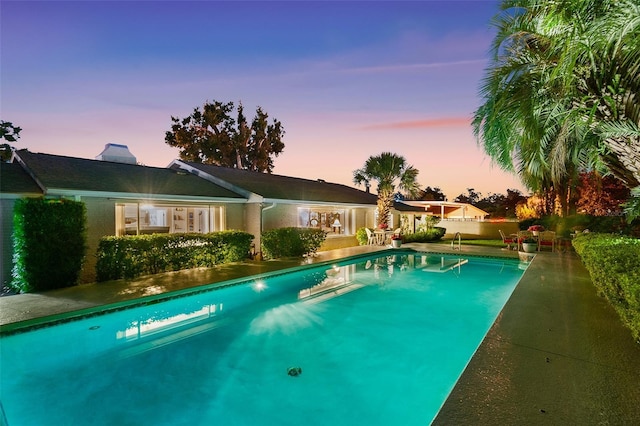 2110 Reaney Rd, Lakeland, FL 33803 - pool at dusk with an outdoor pool