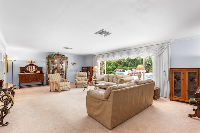2110 Reaney Rd, Lakeland, FL 33803 - carpeted living room with ornamental molding