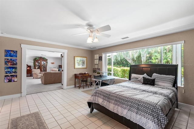 2110 Reaney Rd, Lakeland, FL 33803 - tiled bedroom featuring baseboards, ornamental molding, and ceiling fan