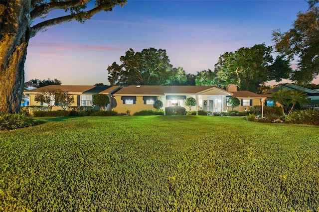 2110 Reaney Rd, Lakeland, FL 33803 - ranch-style house with a front yard