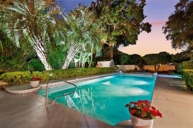 2110 Reaney Rd, Lakeland, FL 33803 - pool at dusk featuring a patio