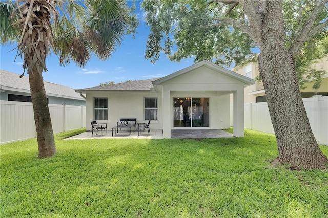 11728 Crest Creek Dr, Riverview, FL 33569 - back of house with stucco siding, a patio area, and roof with shingles