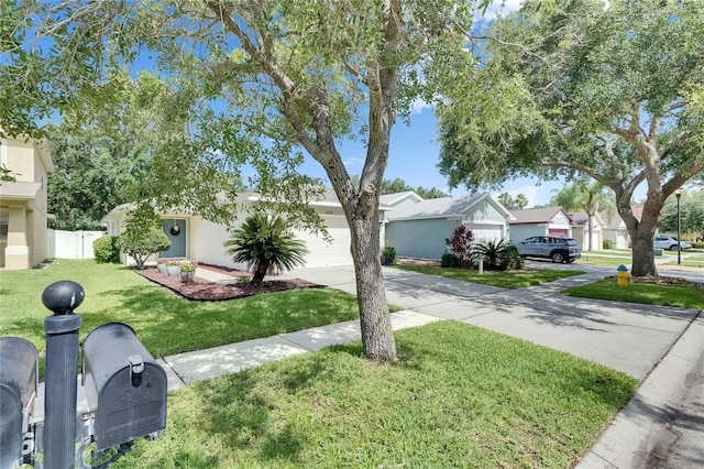 11728 Crest Creek Dr, Riverview, FL 33569 - view of front of house with concrete driveway, a garage, and a residential view