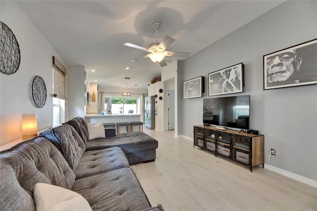 11728 Crest Creek Dr, Riverview, FL 33569 - living area with ceiling fan, light wood finished floors, baseboards, and recessed lighting