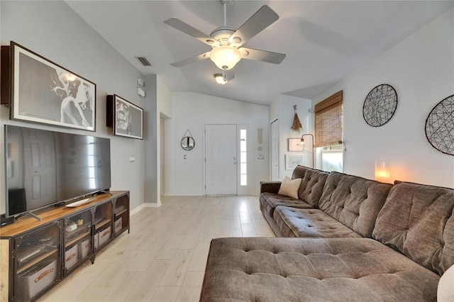11728 Crest Creek Dr, Riverview, FL 33569 - living room featuring lofted ceiling, a ceiling fan, and baseboards