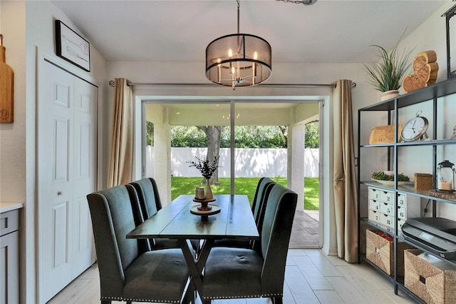 11728 Crest Creek Dr, Riverview, FL 33569 - dining space with healthy amount of natural light and a chandelier