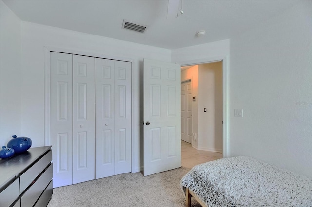 11728 Crest Creek Dr, Riverview, FL 33569 - bedroom with light colored carpet, a closet, and baseboards