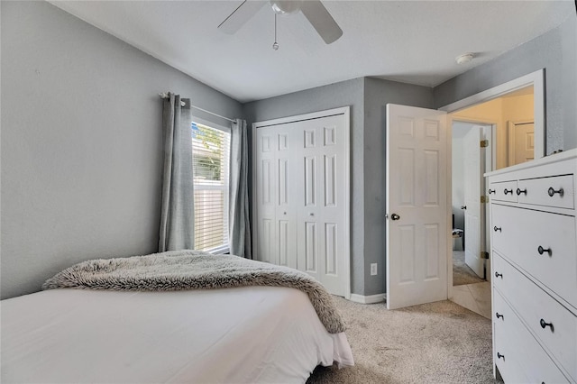 11728 Crest Creek Dr, Riverview, FL 33569 - carpeted bedroom with a closet, ceiling fan, and baseboards