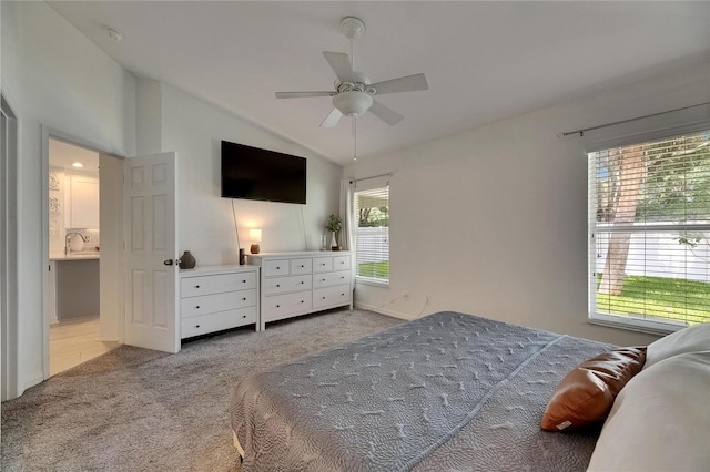 11728 Crest Creek Dr, Riverview, FL 33569 - carpeted bedroom featuring vaulted ceiling, a ceiling fan, and a sink