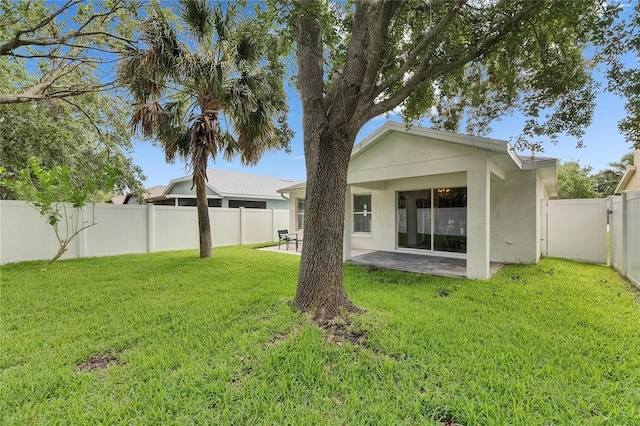 11728 Crest Creek Dr, Riverview, FL 33569 - rear view of property with stucco siding and a patio