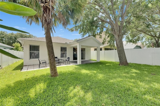11728 Crest Creek Dr, Riverview, FL 33569 - back of house with stucco siding, a patio area, and roof with shingles