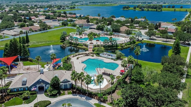 11728 Crest Creek Dr, Riverview, FL 33569 - drone / aerial view of a pool and a nearby body of water