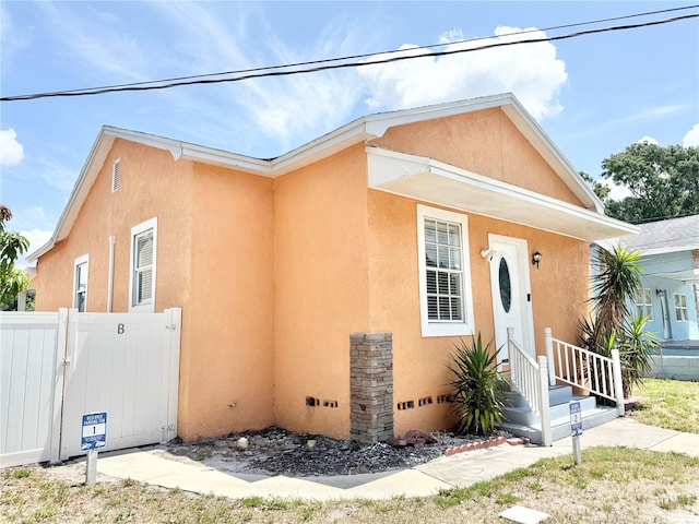 2137 W Saint Louis St, Tampa, FL 33607 - view of front of property featuring stucco siding