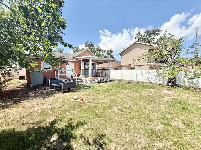 2137 W Saint Louis St, Tampa, FL 33607 - view of yard featuring a wooden deck