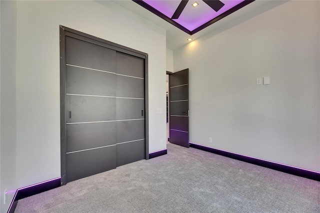 6532 Simone Shores Cir, Apollo Beach, FL 33572 - unfurnished bedroom with carpet, ceiling fan, and baseboards