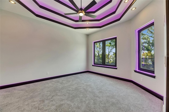 6532 Simone Shores Cir, Apollo Beach, FL 33572 - carpeted spare room featuring ceiling fan, a raised ceiling, baseboards, and recessed lighting