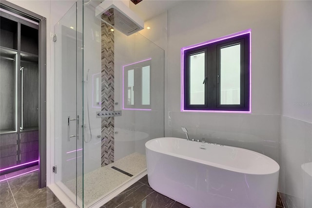 6532 Simone Shores Cir, Apollo Beach, FL 33572 - full bath featuring a shower stall, marble finish floors, and a freestanding tub