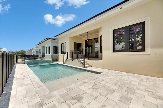 6532 Simone Shores Cir, Apollo Beach, FL 33572 - view of pool featuring a patio area, a ceiling fan, and a pool with connected hot tub