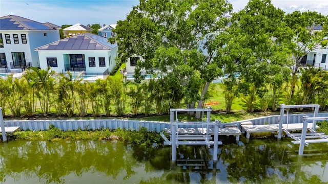 6532 Simone Shores Cir, Apollo Beach, FL 33572 - dock area featuring a water view and boat lift