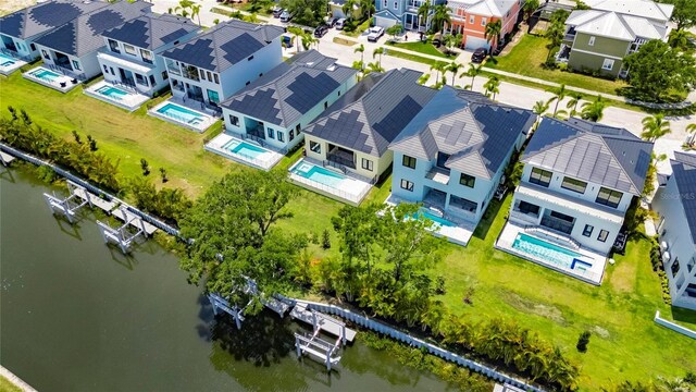 6532 Simone Shores Cir, Apollo Beach, FL 33572 - aerial perspective of suburban area with a nearby body of water and a pool