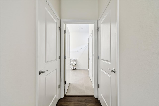 32825 Sand Creek Dr, Wesley Chapel, FL 33543 - hall featuring dark tile patterned flooring