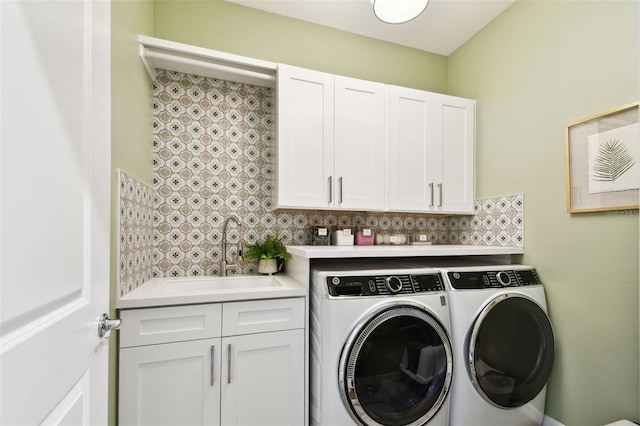 32825 Sand Creek Dr, Wesley Chapel, FL 33543 - laundry area with separate washer and dryer and cabinet space