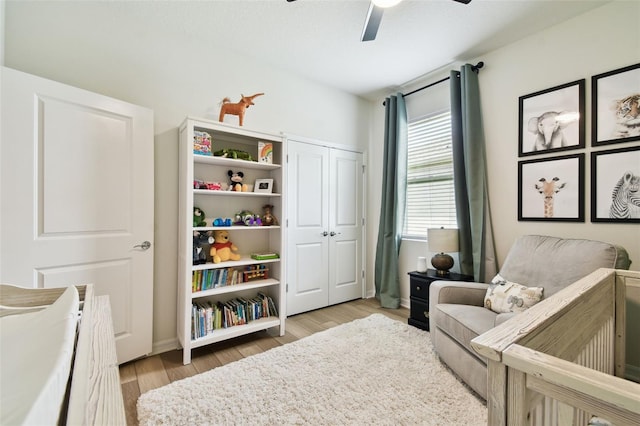32825 Sand Creek Dr, Wesley Chapel, FL 33543 - sitting room featuring ceiling fan, wood finished floors, and baseboards