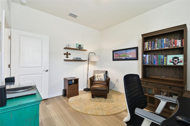 32825 Sand Creek Dr, Wesley Chapel, FL 33543 - home office featuring light wood-style floors and baseboards
