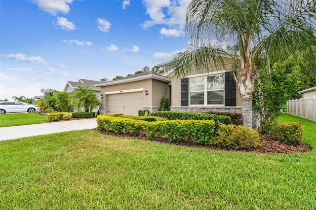 32825 Sand Creek Dr, Wesley Chapel, FL 33543 - view of front of home featuring stucco siding, an attached garage, driveway, and stone siding
