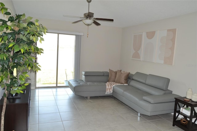 16725 Delia St, Wimauma, FL 33598 - living room with a ceiling fan and light tile patterned floors