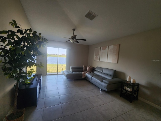 16725 Delia St, Wimauma, FL 33598 - living area with ceiling fan, tile patterned floors, and a water view