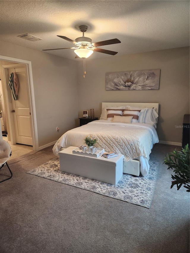 16725 Delia St, Wimauma, FL 33598 - carpeted bedroom featuring a textured ceiling and ceiling fan