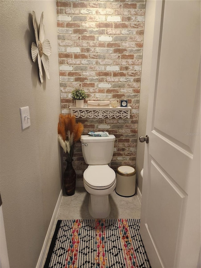 16725 Delia St, Wimauma, FL 33598 - bathroom featuring toilet and baseboards