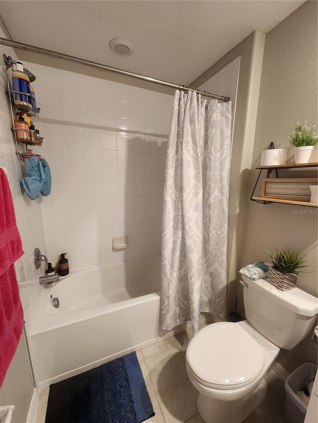 16725 Delia St, Wimauma, FL 33598 - bathroom featuring shower / bath combo and tile patterned floors