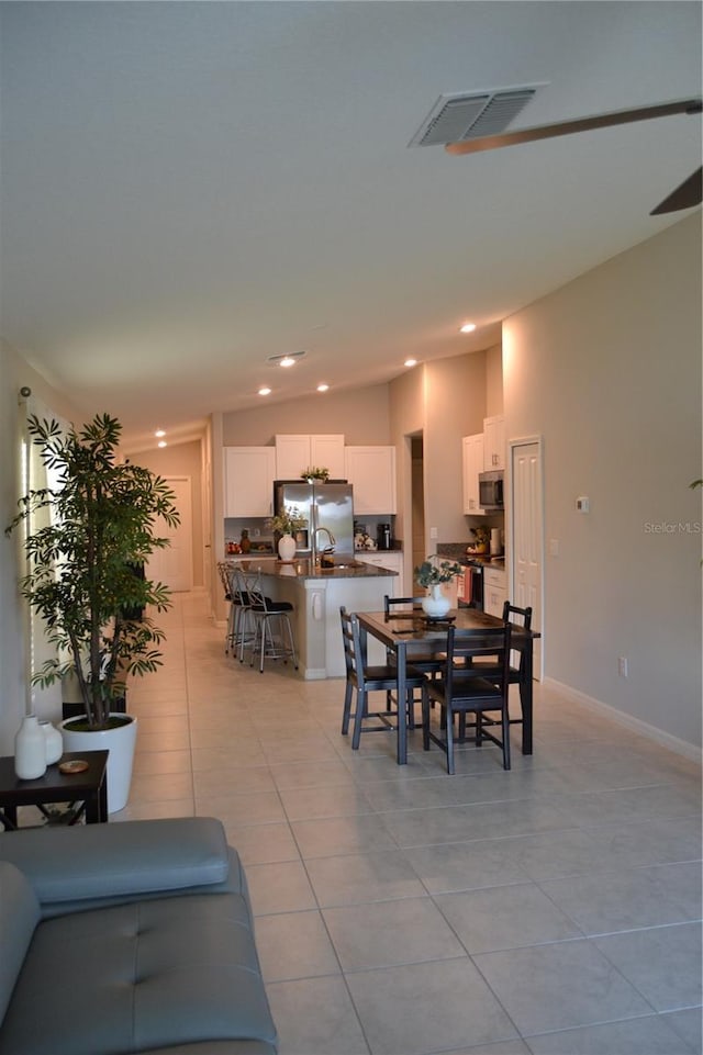 16725 Delia St, Wimauma, FL 33598 - dining area featuring light tile patterned floors and recessed lighting