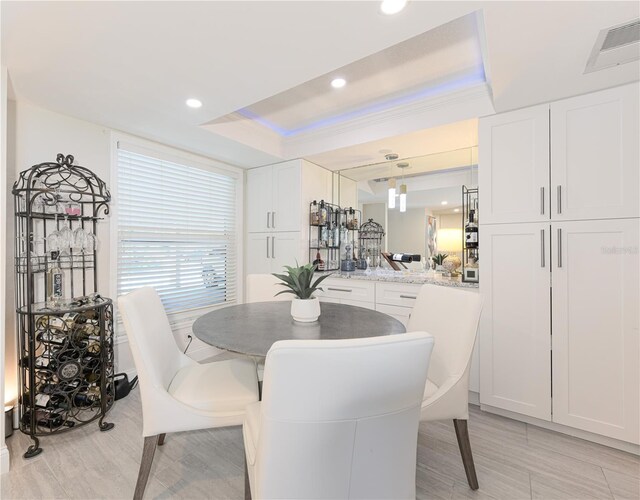 2335 Beneva Ter Unit 2254, Sarasota, FL 34232 - dining space with a raised ceiling and recessed lighting
