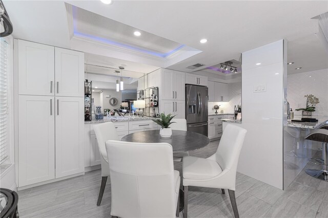 2335 Beneva Ter Unit 2254, Sarasota, FL 34232 - dining space with a raised ceiling and recessed lighting