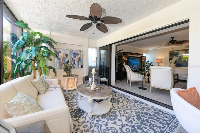 2335 Beneva Ter Unit 2254, Sarasota, FL 34232 - living area with a ceiling fan and a textured ceiling