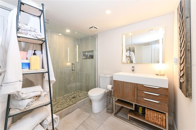 2335 Beneva Ter Unit 2254, Sarasota, FL 34232 - bathroom featuring vanity, toilet, a shower stall, and recessed lighting