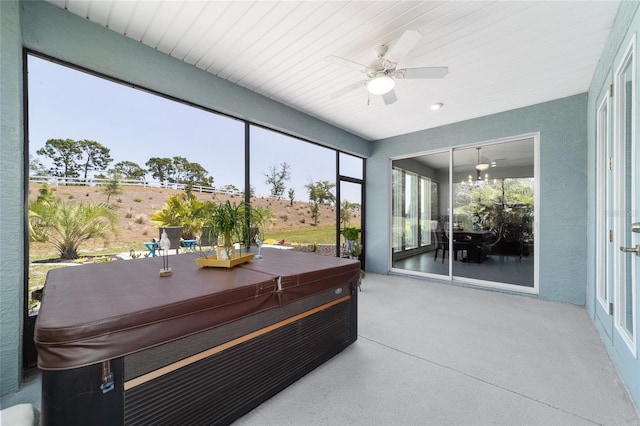 10298 SW 96th Loop, Ocala, FL 34481 - sunroom with a hot tub, a ceiling fan, and healthy amount of natural light