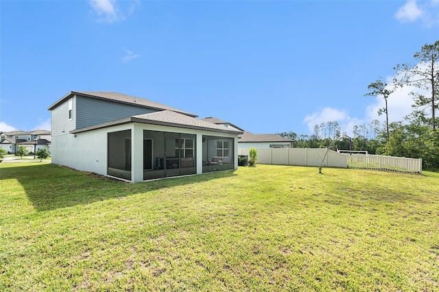 30572 Thunderbird Dr, Wesley Chapel, FL 33545 - back of house with a sunroom
