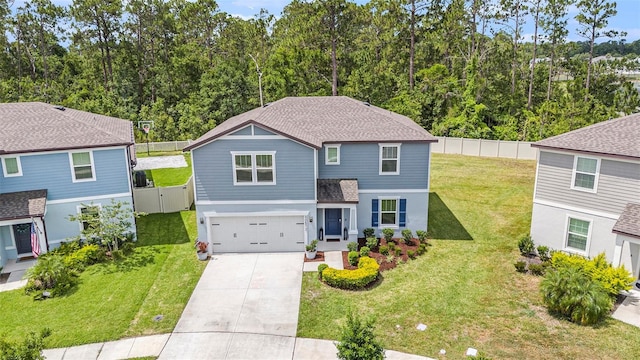 30572 Thunderbird Dr, Wesley Chapel, FL 33545 - view of front facade with a garage, driveway, and roof with shingles