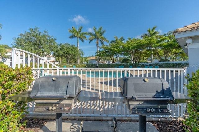 15958 Marcello Cir, Naples, FL 34110 - deck featuring area for grilling