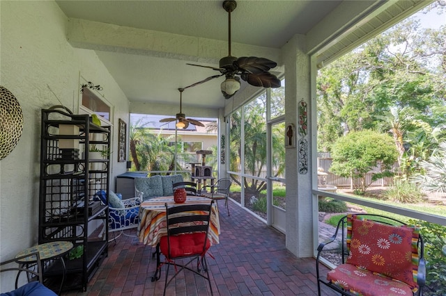 2015 Long Branch Ln, Clearwater, FL 33760 - sunroom with ceiling fan and an outdoor living space